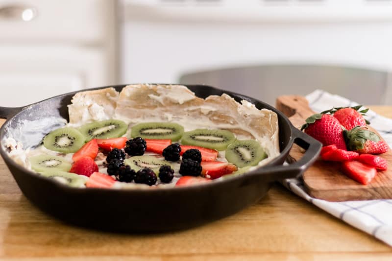 Sourdough pizza crust with cream cheese sauce and topped with fresh fruit.