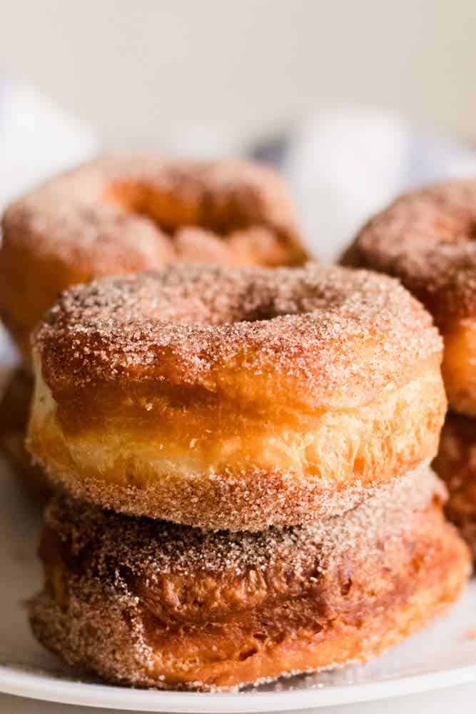 stack of homemade cinnamon sugar donuts.