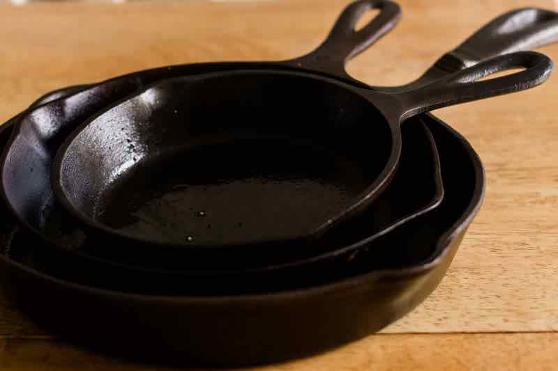 Stack of skillets just seasoned.