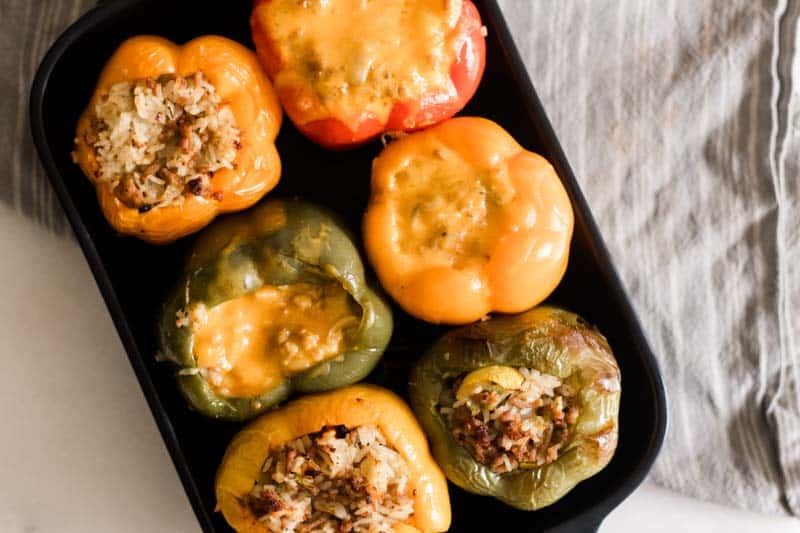 Fresh baked peppers filled with rice sausage and onions.