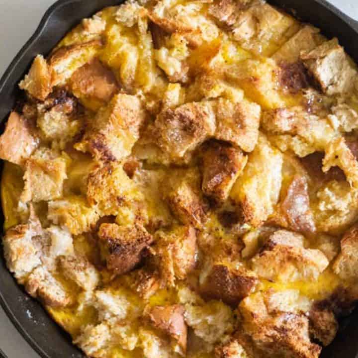 Homemade sourdough french toast casserole in a cast iron skillet