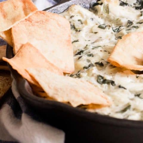 Spinach artichoke dip with a side of chips.