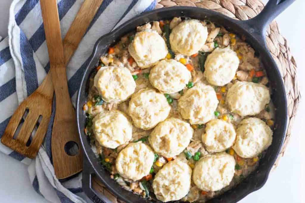 Cast iron chicken pot pie with homemade biscuits.