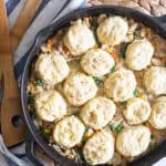 Cast iron chicken pot pie with homemade biscuits.