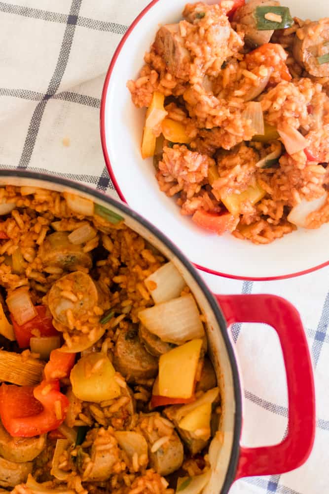 Sausage pepper and rice skillet in a dutch oven.