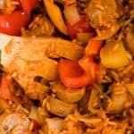 Mexican one-dish rice and sausage with peppers and onions.