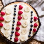 Homemade independence day cake with fruit stripes.
