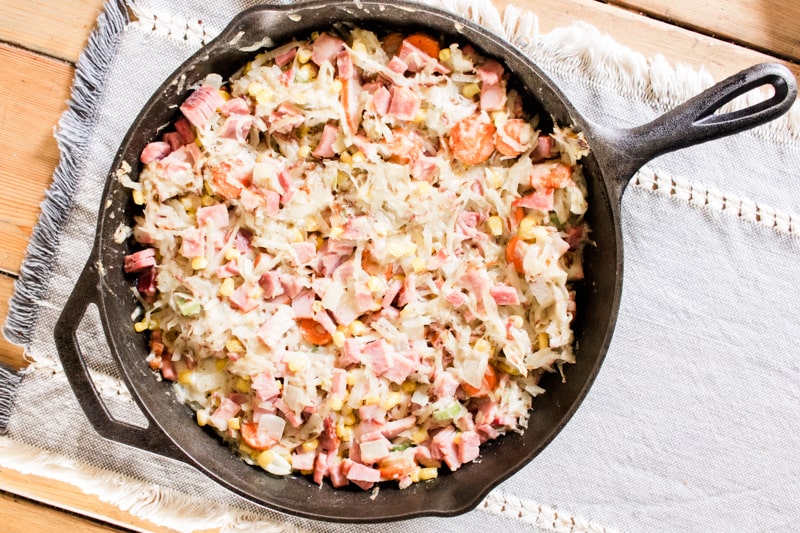 Hash brown casserole without soup on wooden table.