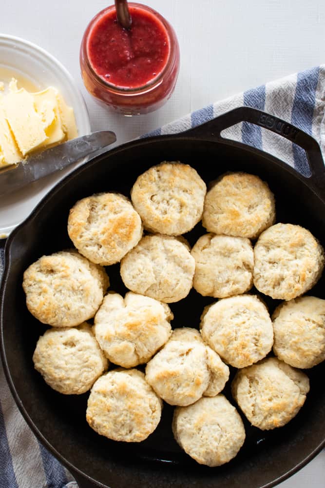 Honey skillet biscuits with butter and homemade jelly.