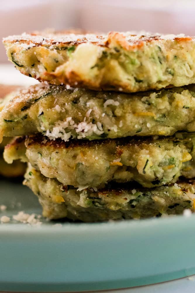 Tall stack of zucchini pancakes.