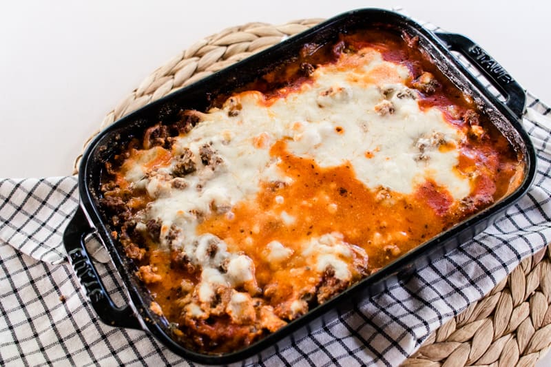 Zucchini lasagna with a thick layer of mozzarella cheese melted into the top.