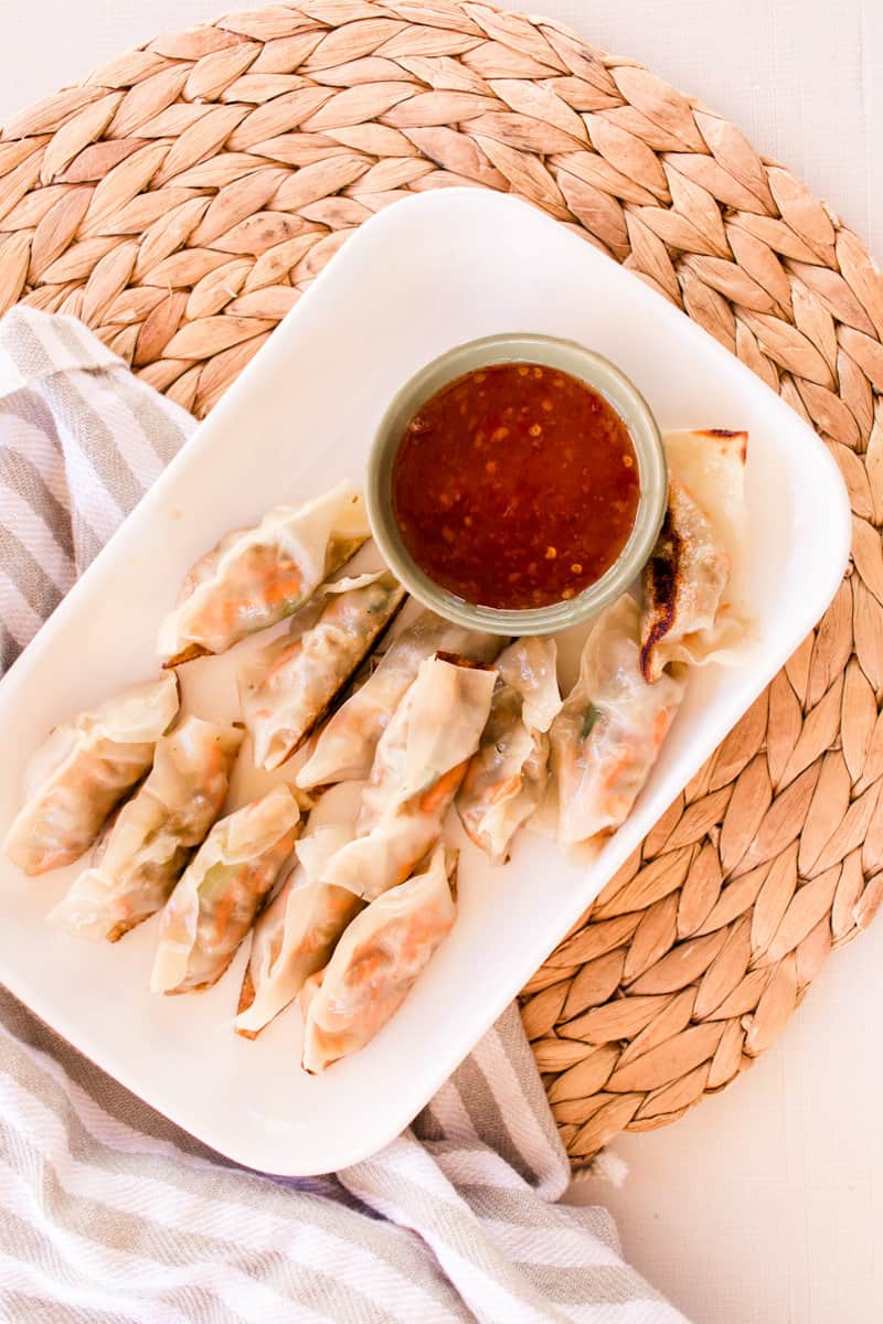 Tender lamb dumplings with sweet chili dipping sauce.