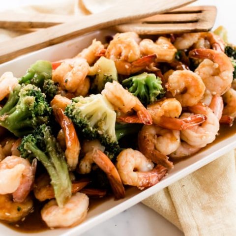 Hearty shrimp platter with broccoli.