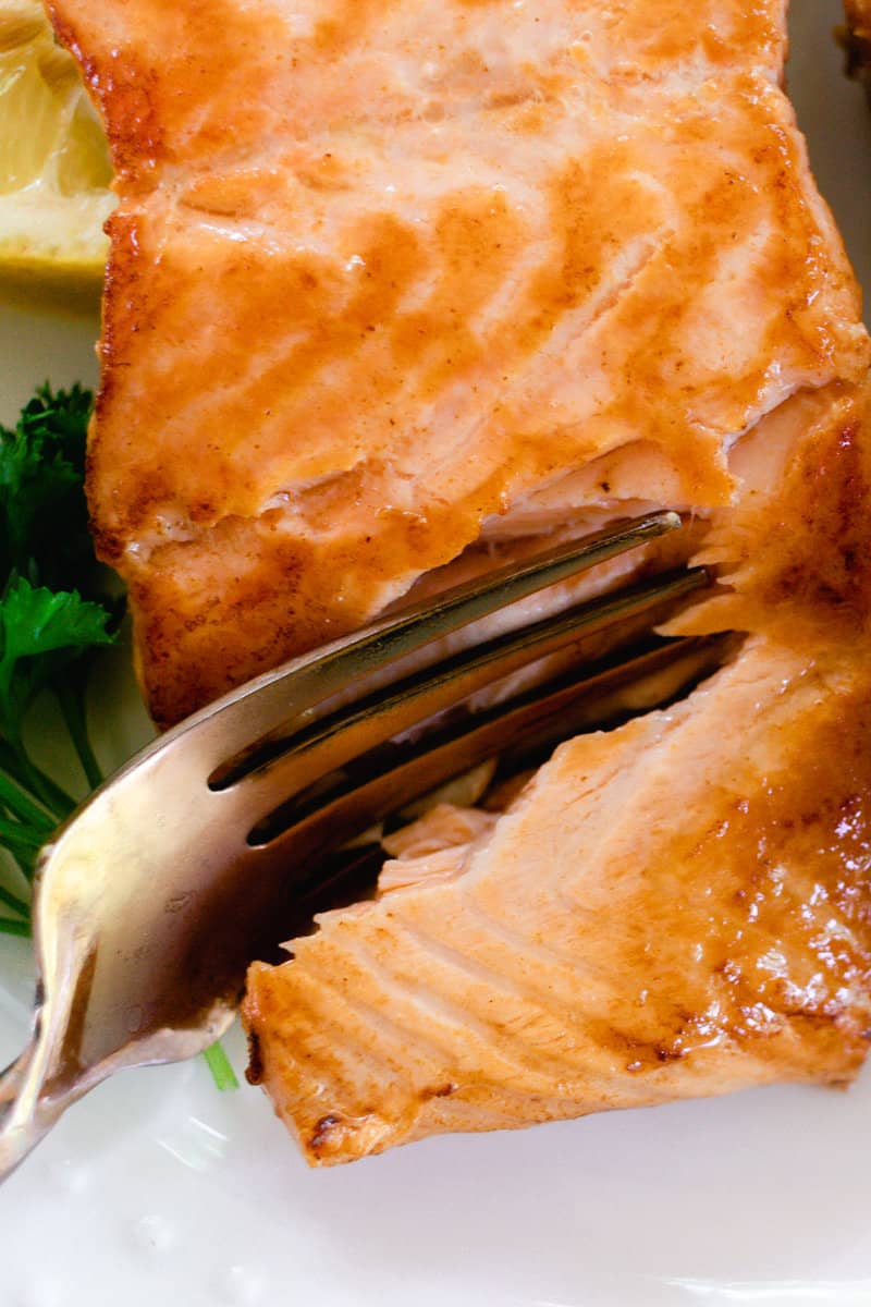 Dry brine salmon on a serving plate.