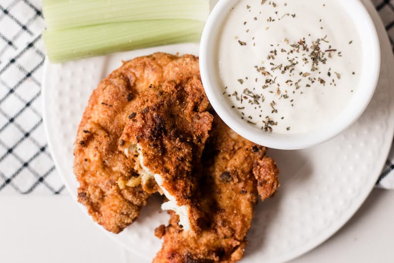 Fried chicken tenders that were made in a dutch oven.