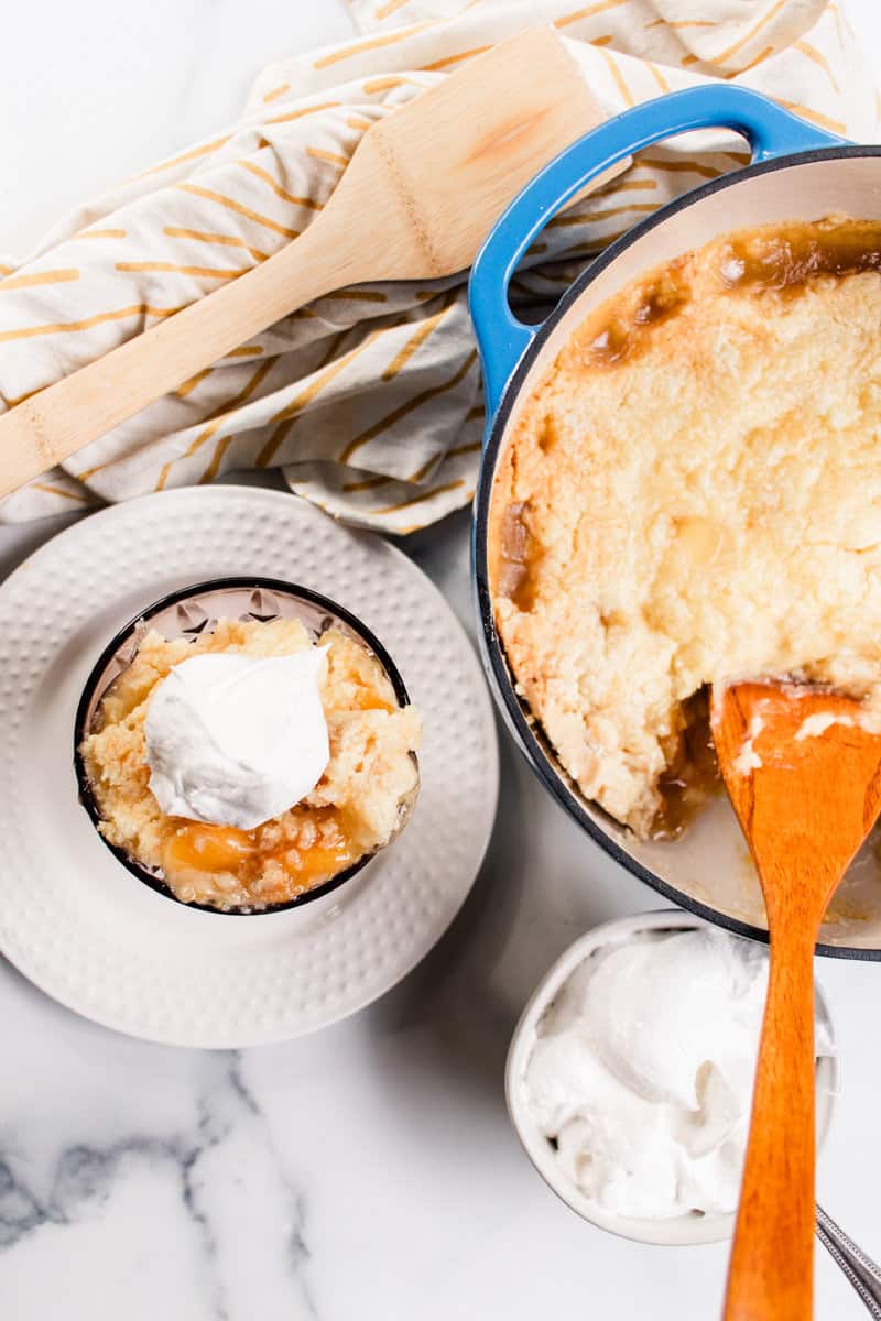 Dump cake in the dutch oven and plated on a single serving bowl on a marble colored counter. 