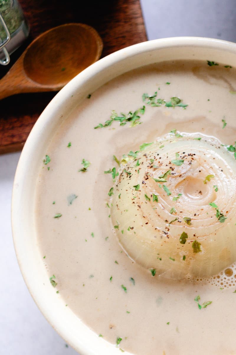 A tender onion boiled in a savory broth.