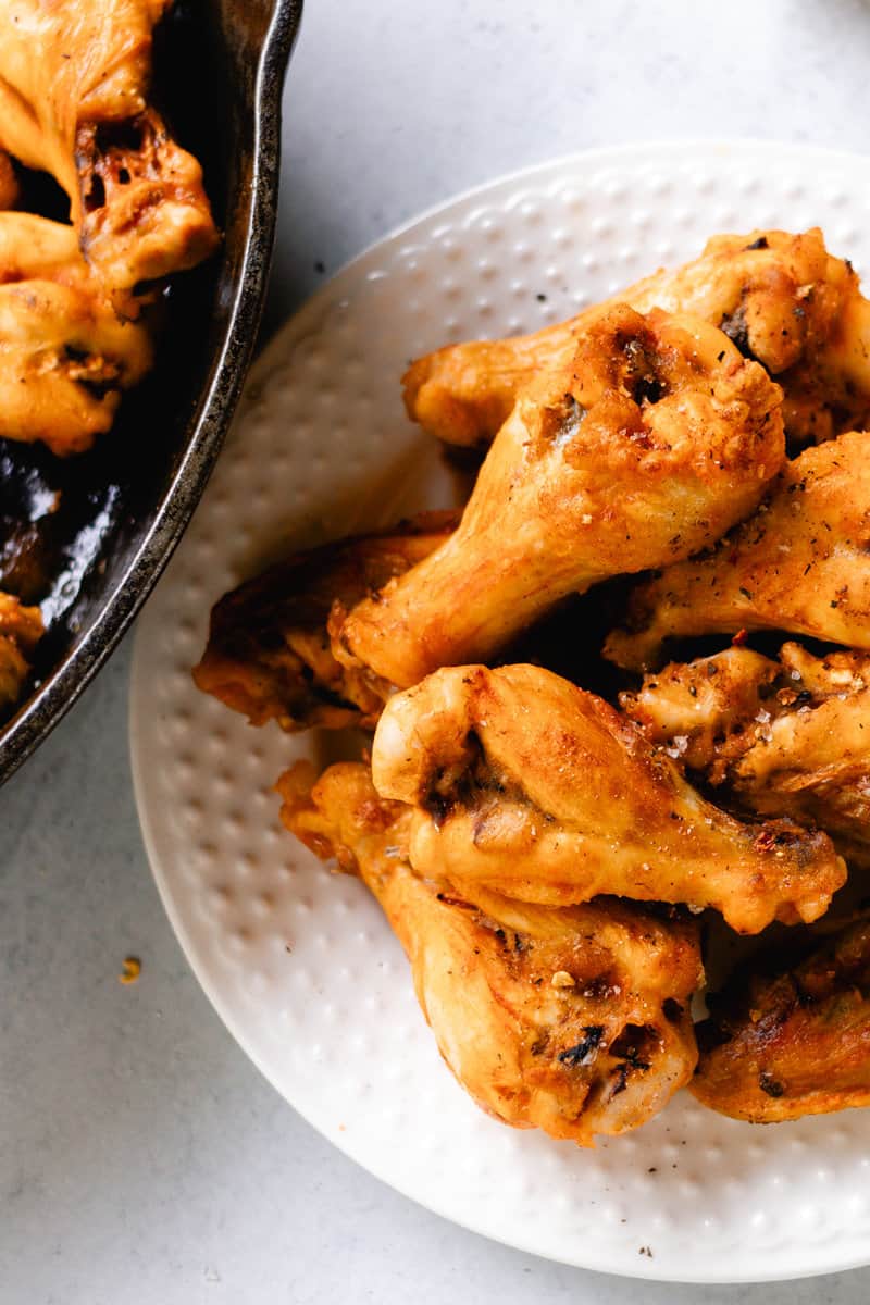 Crispy chicken wings that were boiled then broiled in the oven.