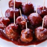 Cranberry elk meatballs being served as party appetizers.