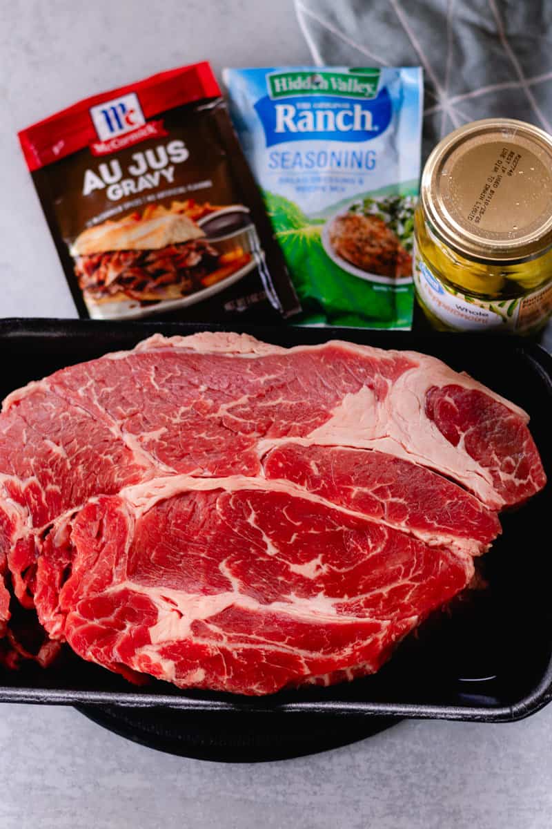 Mississippi pot roast ingredients on a counter.