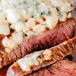 Flat iron steak with melted blue cheese crumbles.