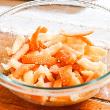 Sour candied citrus fruit peels in a glass bowl.
