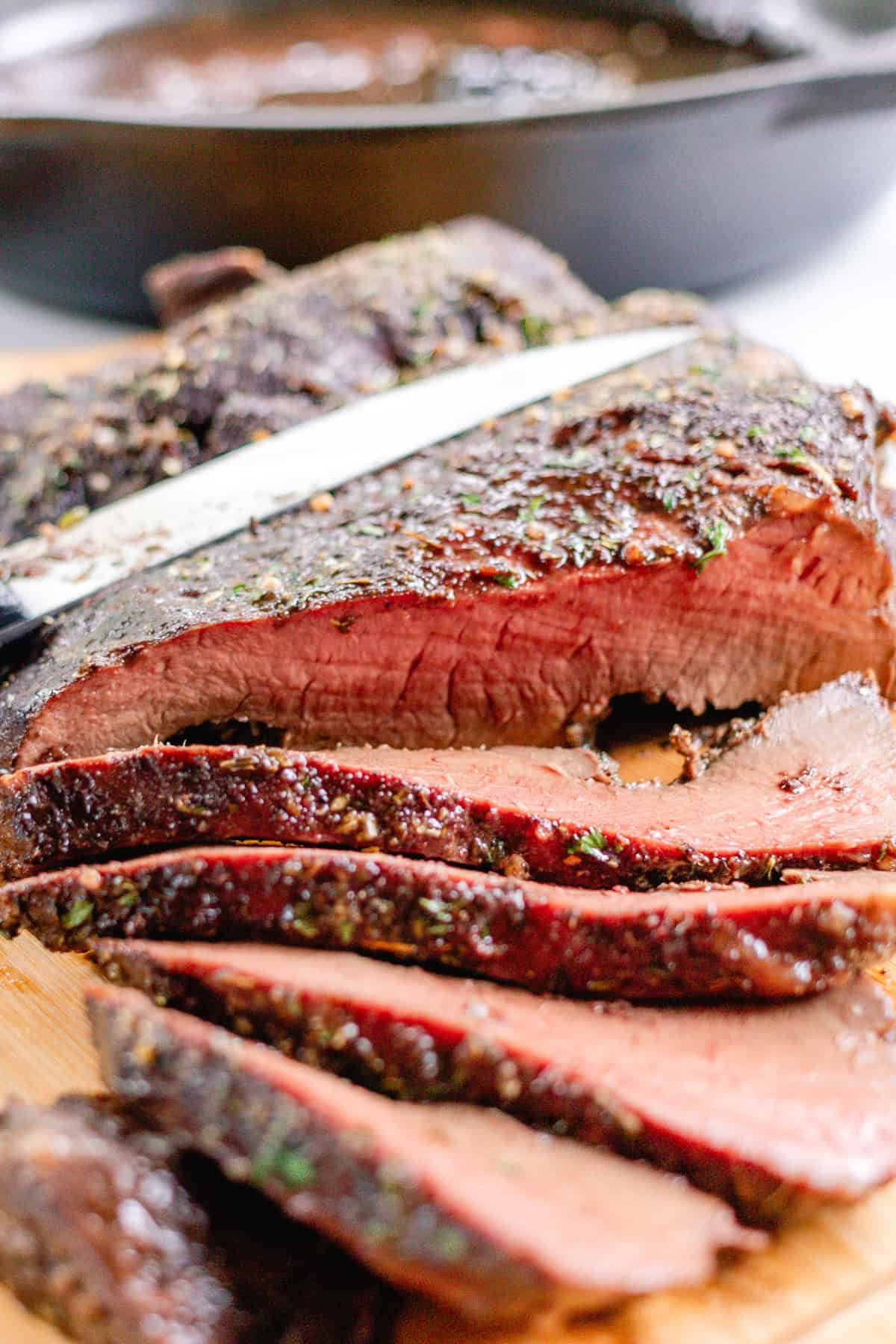 Cutting the meat with a sharp knife. 