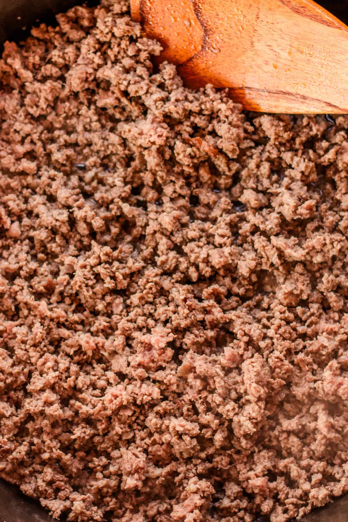 Browning the meat in a large cast iron skillet. 