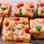 M&M Christmas cookie bars cooling on a wire rack.