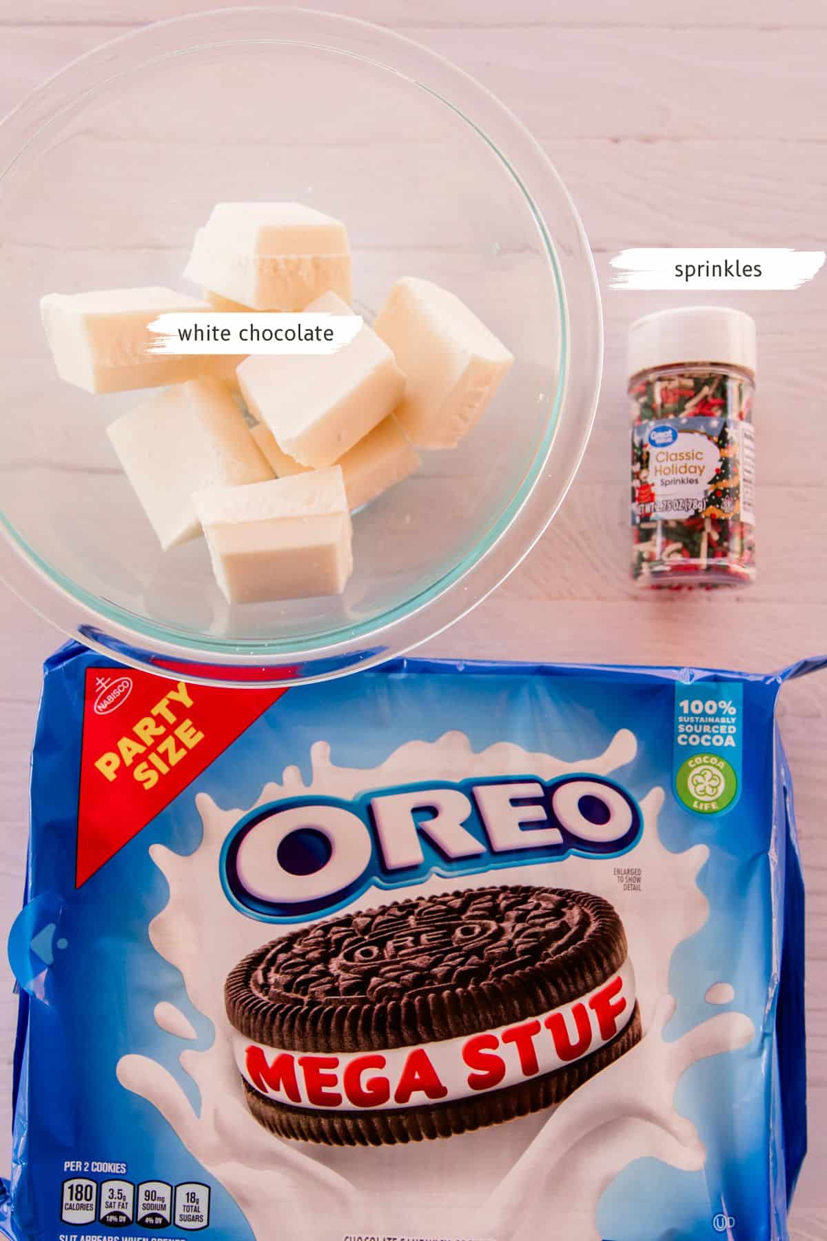 Ingredients for dipped oreos on a white table. 