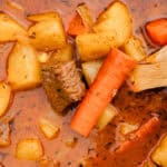 Fresh venison stew in a dutch oven.