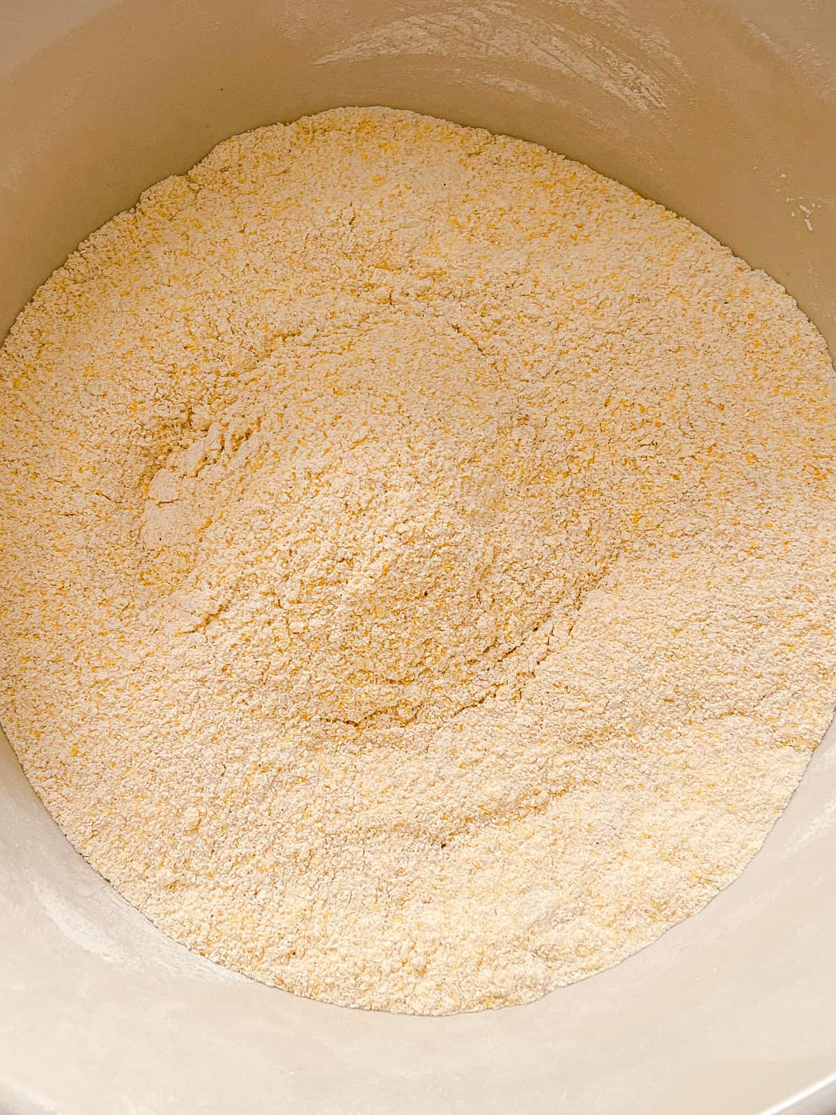 Dry ingredients fully mixed in a bowl.
