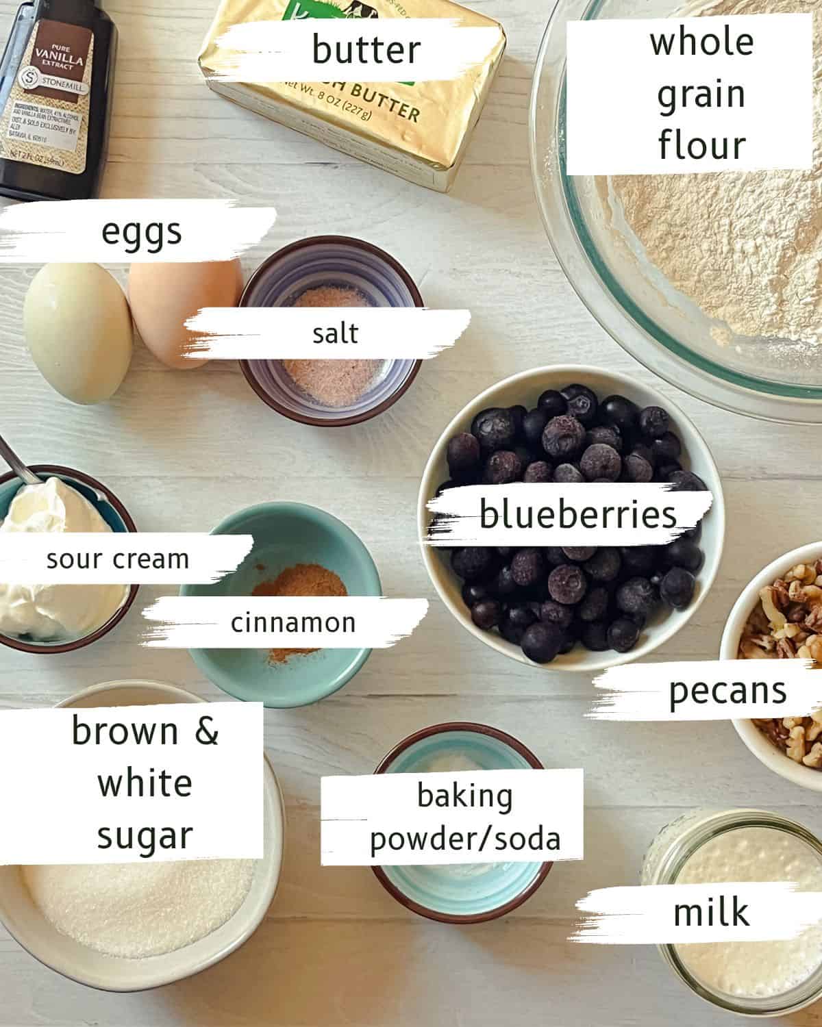Whole grain blueberry muffin ingredients assembled and labeled.