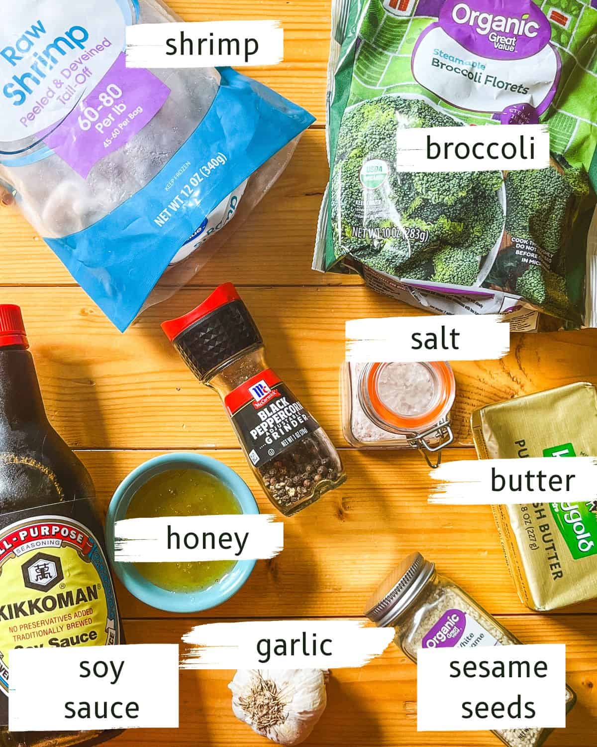 Shrimp and Broccoli Stir Fry ingredients laid out on a wooden table, with text label overlays.