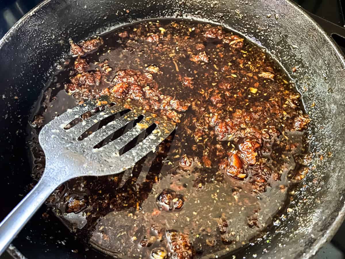 Cooking garlic in a cast iron skillet.