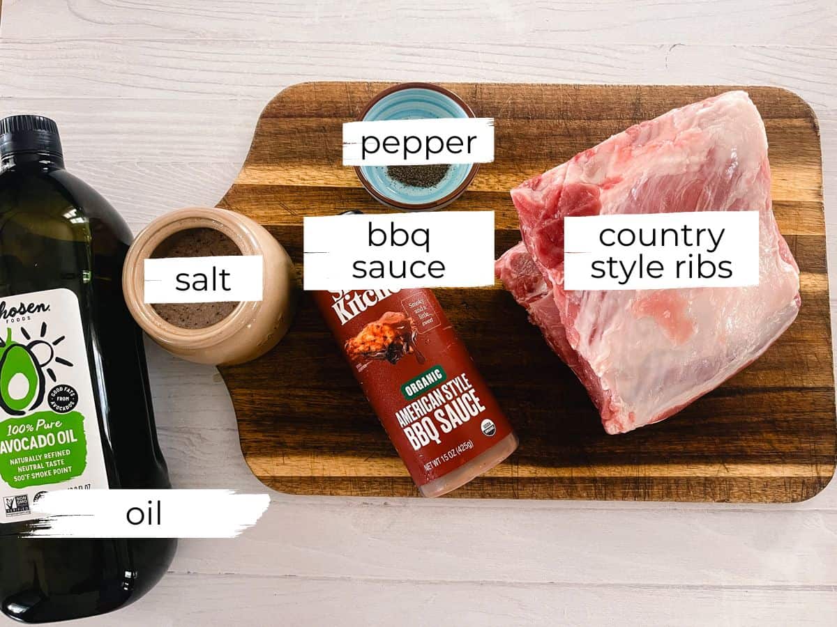 Country style ribs ingredients labeled on a wooden cutting board.