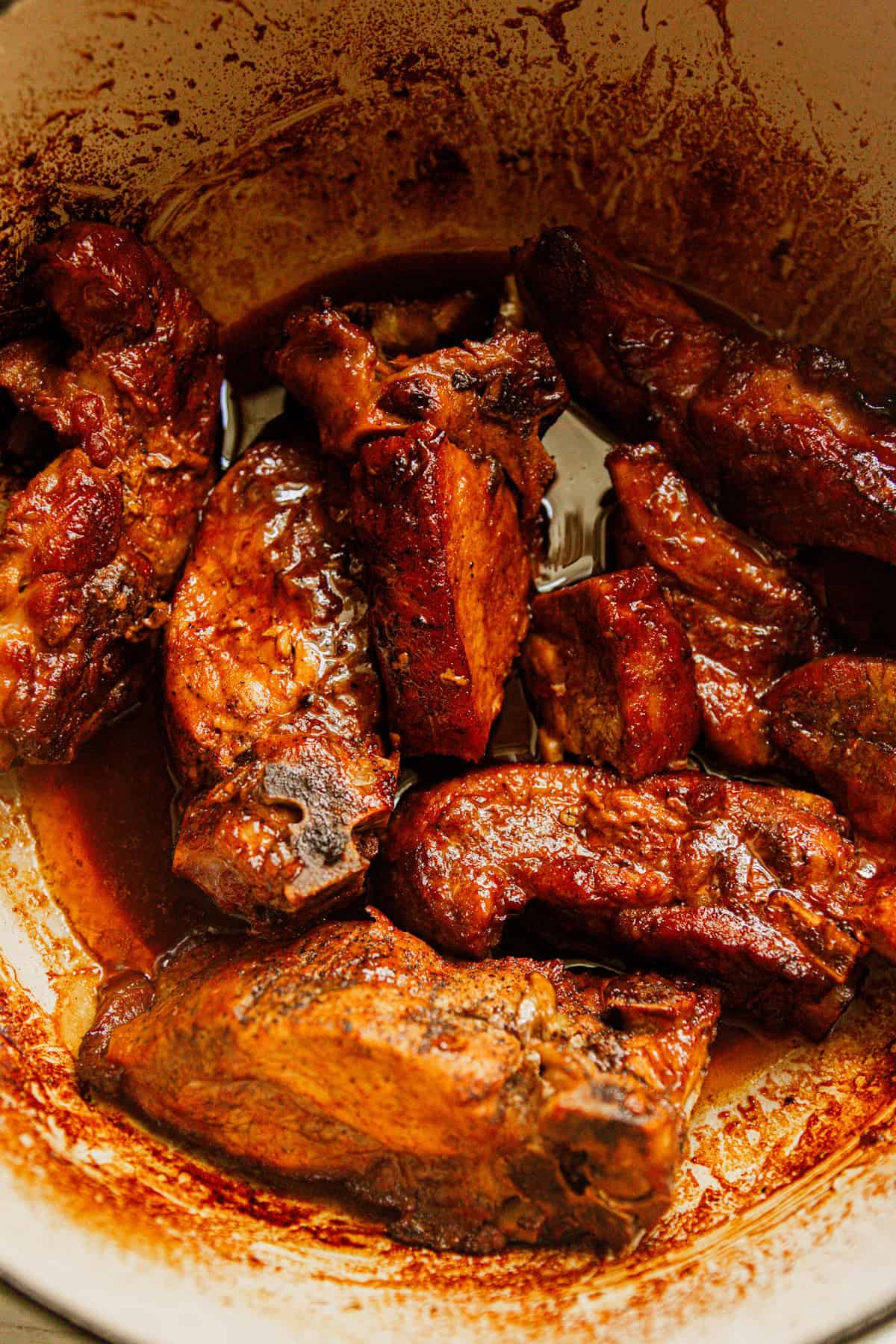 Country-style ribs in a dutch oven. 