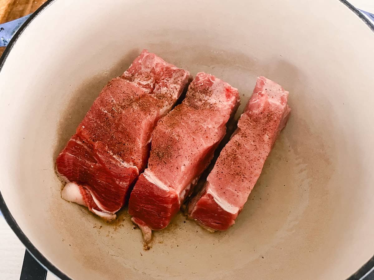 Searing country-style ribs in a dutch oven. 