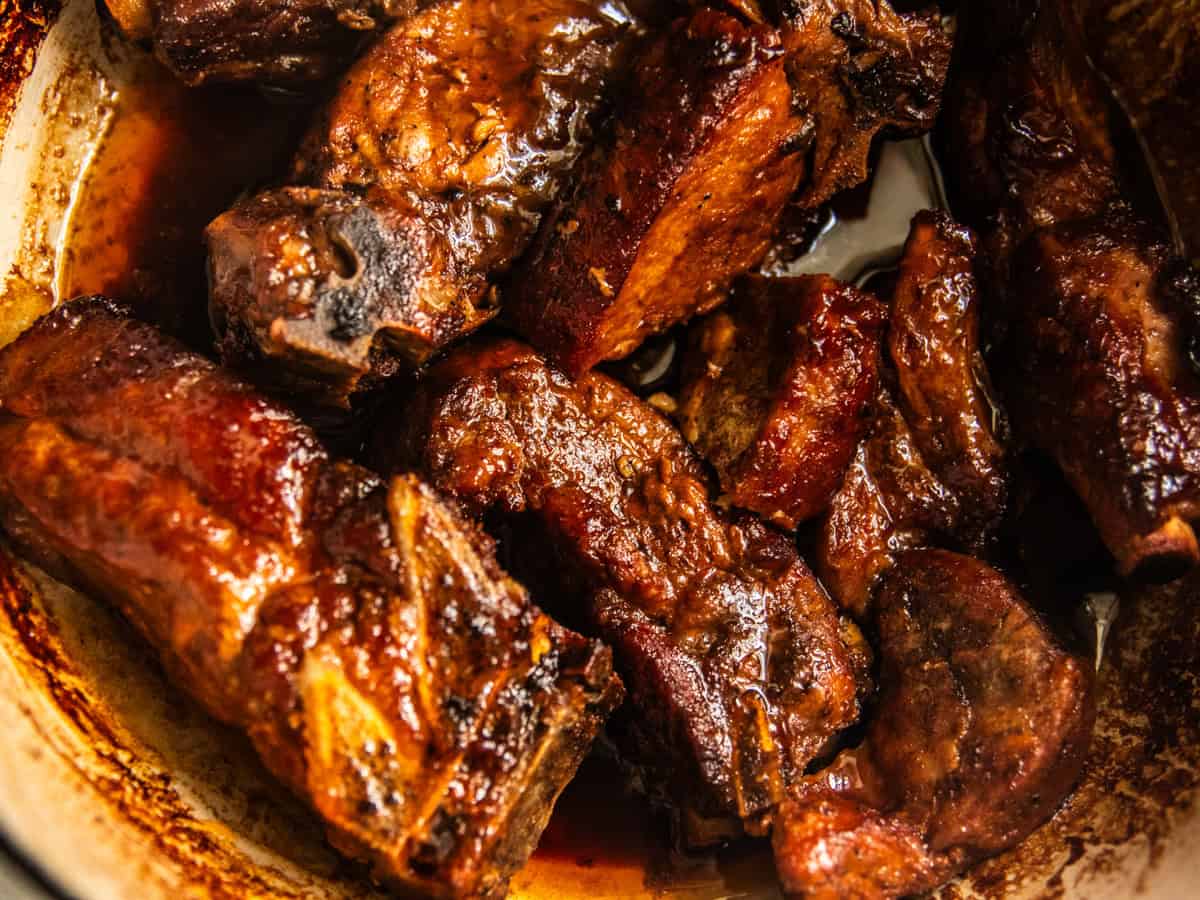 Country-style ribs in a dutch oven. 