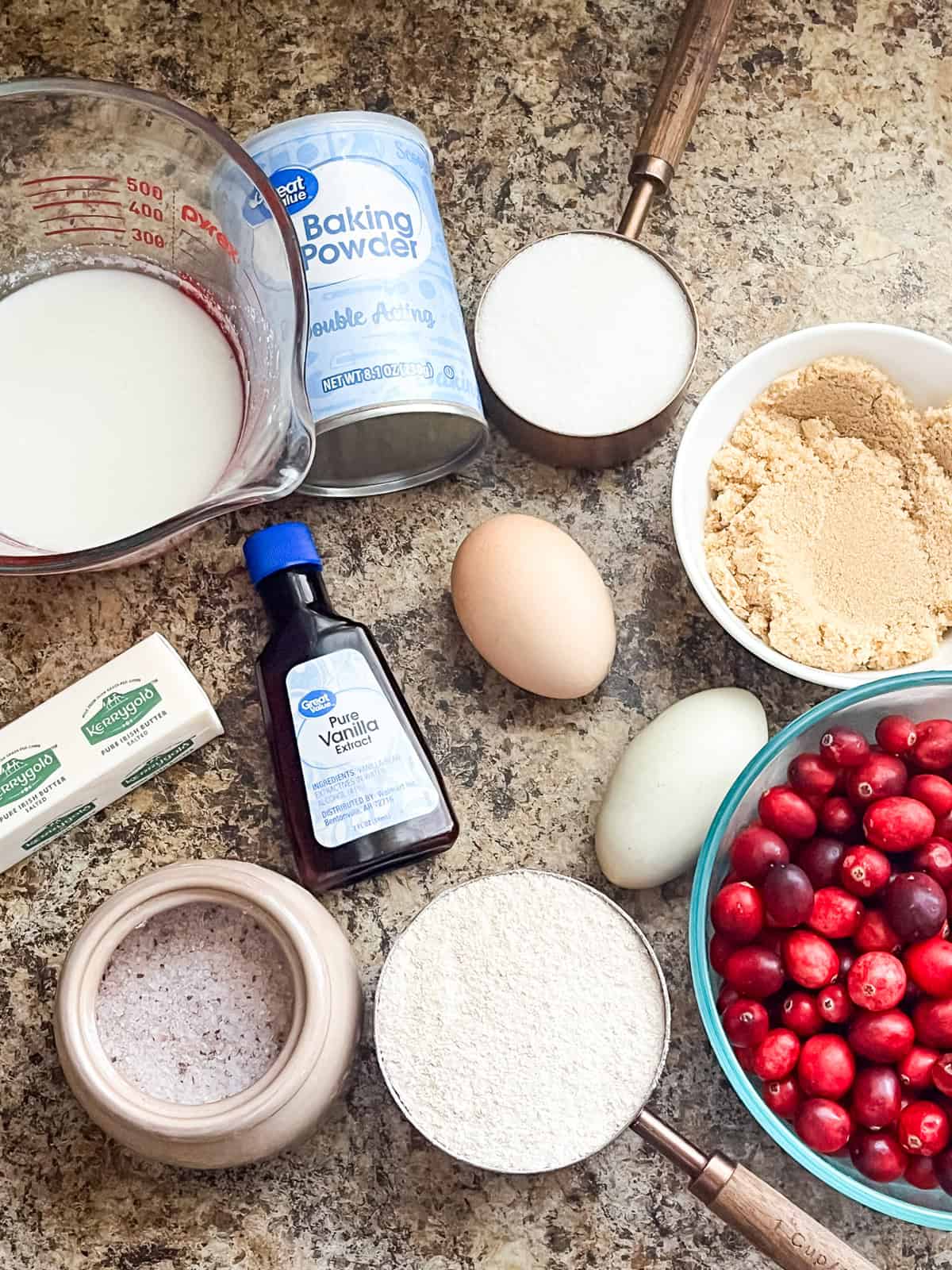 Whole grain cranberry bread ingredients on a kitchen counter.