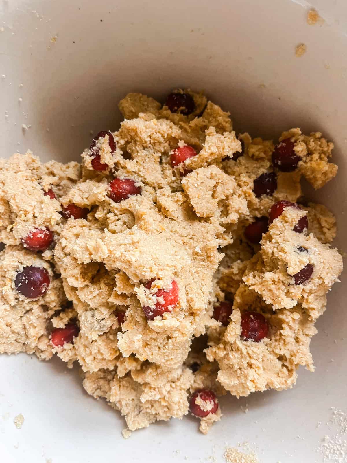 Raw scone batter in a bowl.