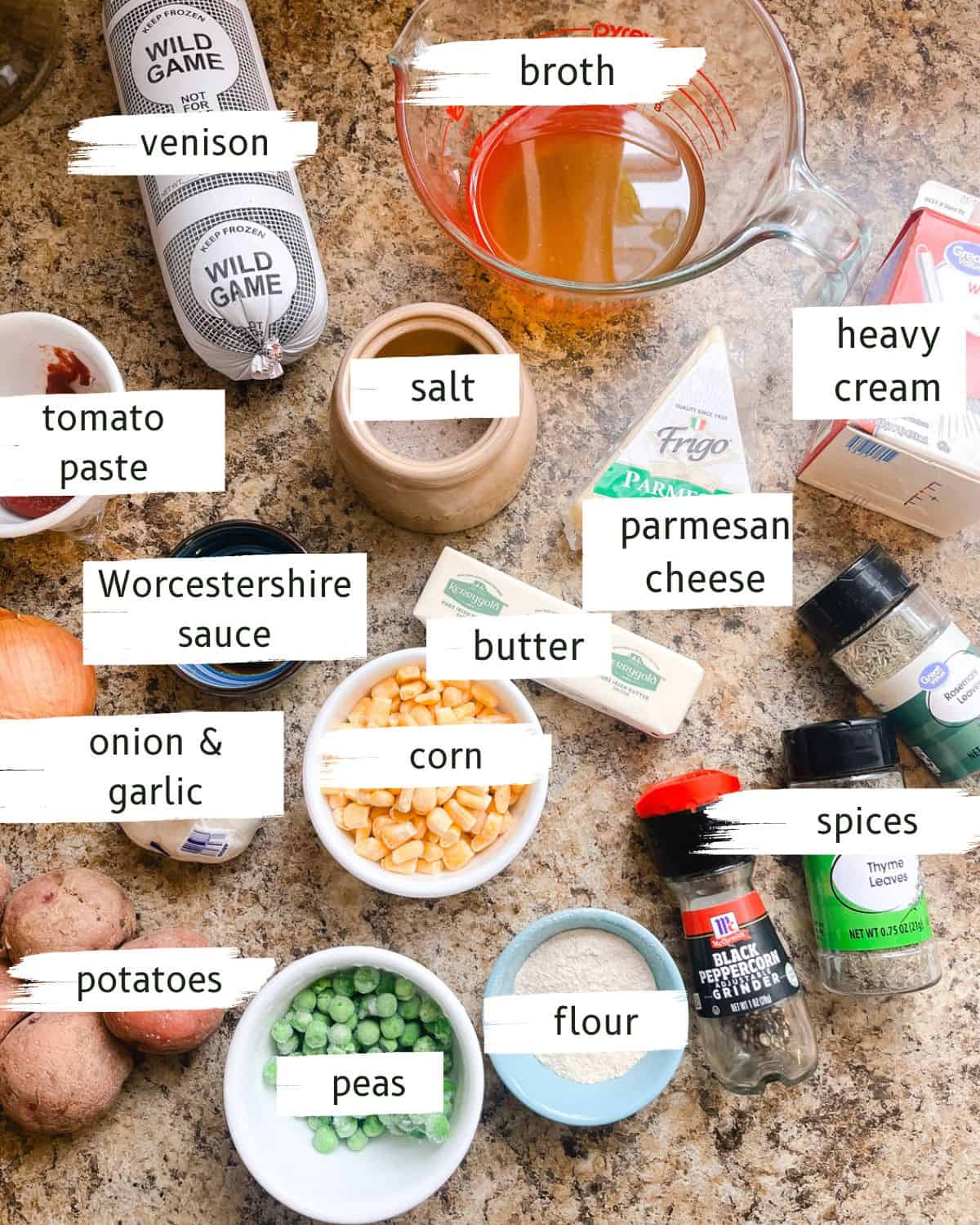 Venison shepherd's pie ingredients labeled on a kitchen counter.