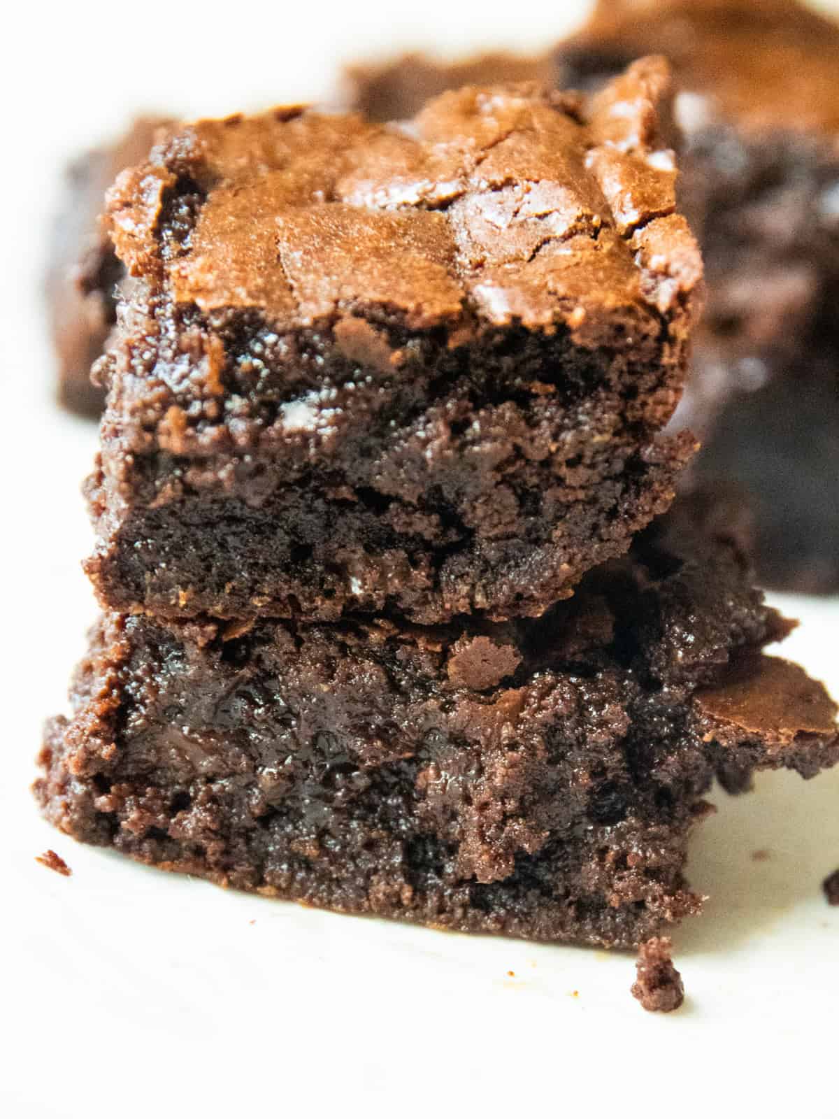 A stack of two fresh milled flour brownies.