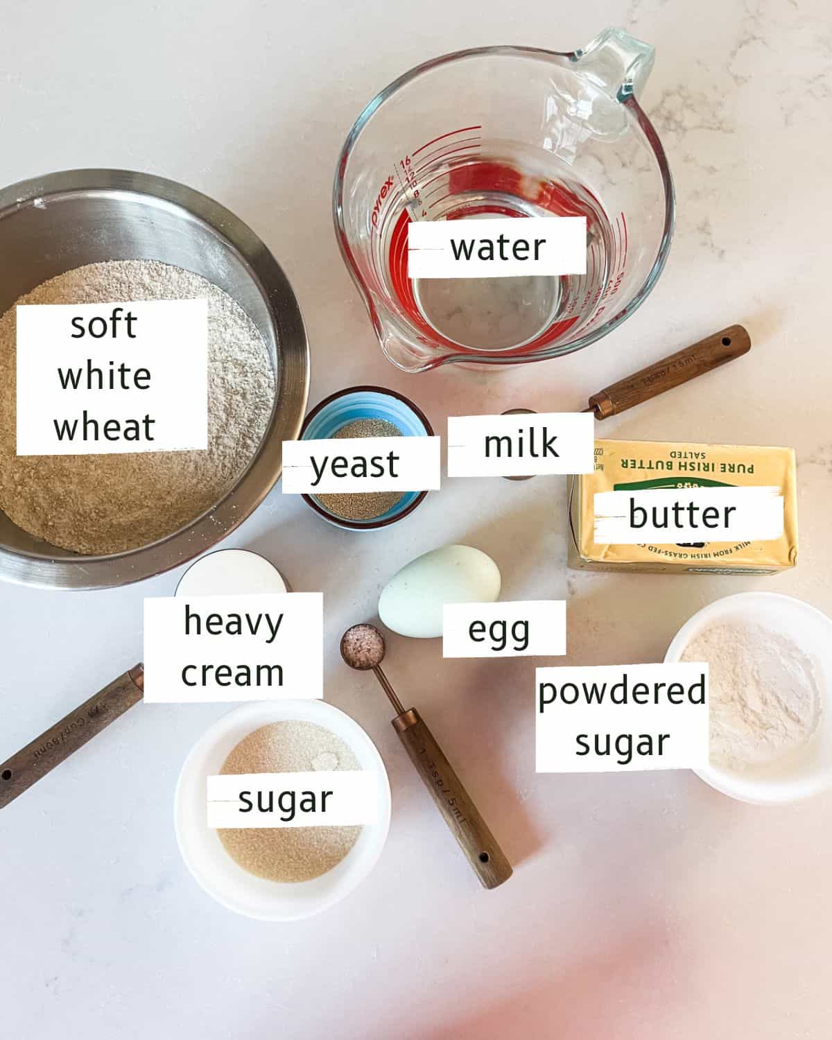 Twisted donut ingredients labeled on a kitchen counter.