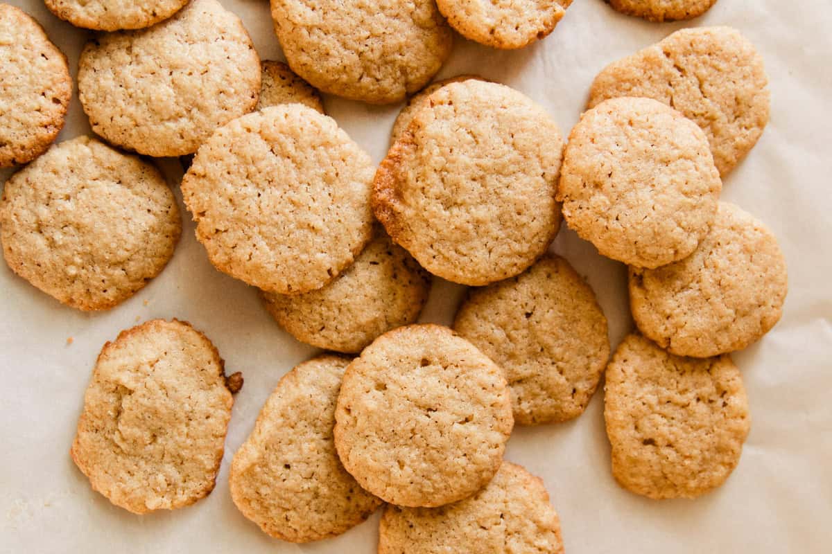 Fresh milled vanilla wafers on a white tray.