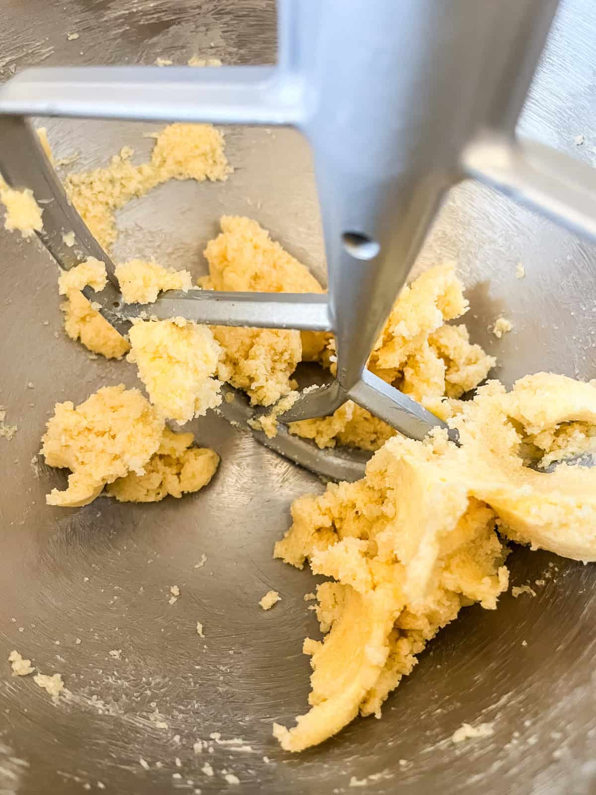 Creaming butter and sugar in a stand mixer.