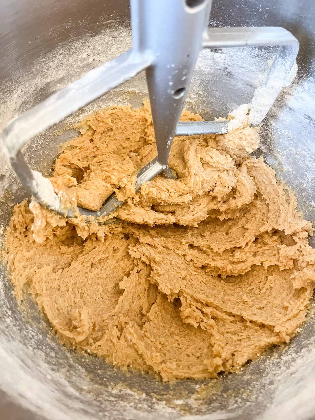 Mixing fresh milled flour vanilla wafer dough in a stand mixer.