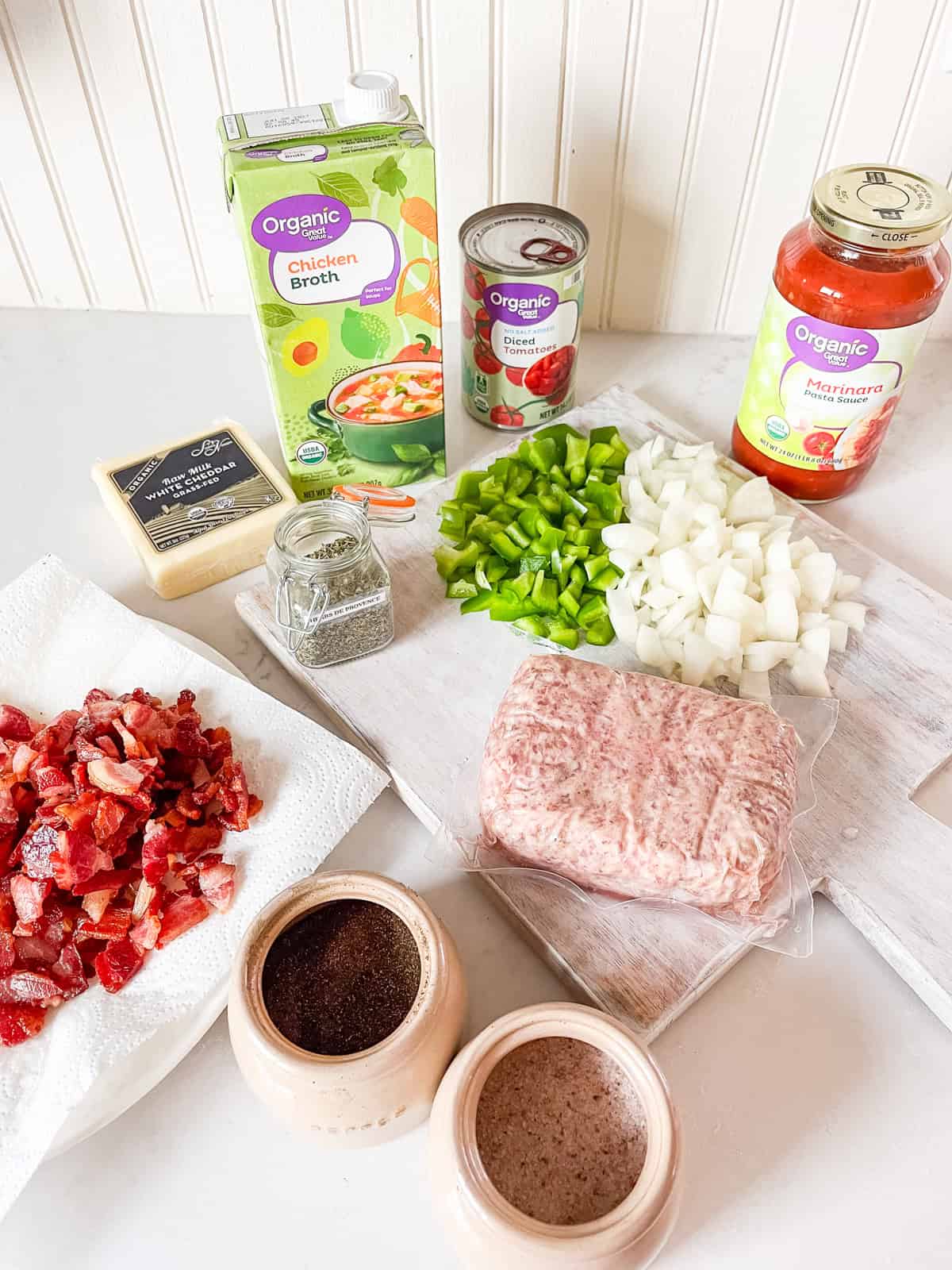 Dutch oven pizza soup ingredients assembled on a kitchen countertop.