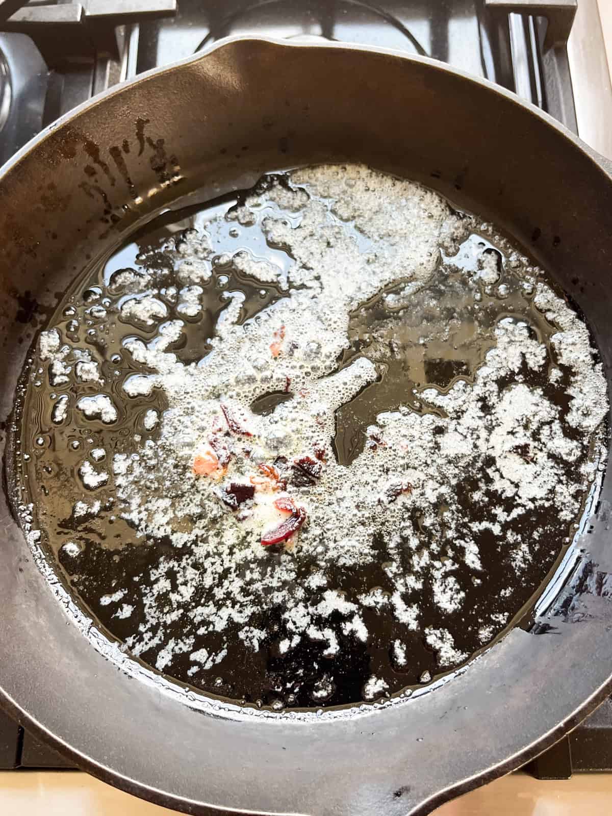 Bacon grease in a cast iron skillet.