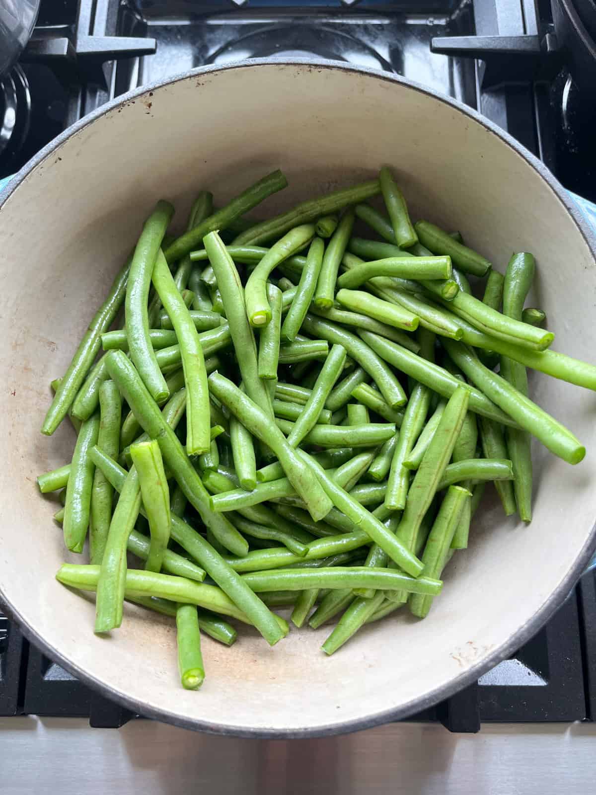 Fresh green beans in a dutch oven.
